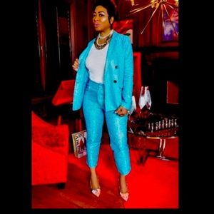 Glamorous 2 piece aqua blue suit  just in time for New Year’s Eve.